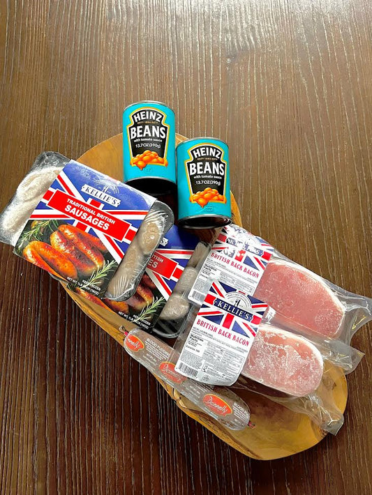 A selection of authentic British Breakfast Food including; Heinz Baked Beans, British Back Bacon, Irish Black Pudding and Traditional British Sausages.