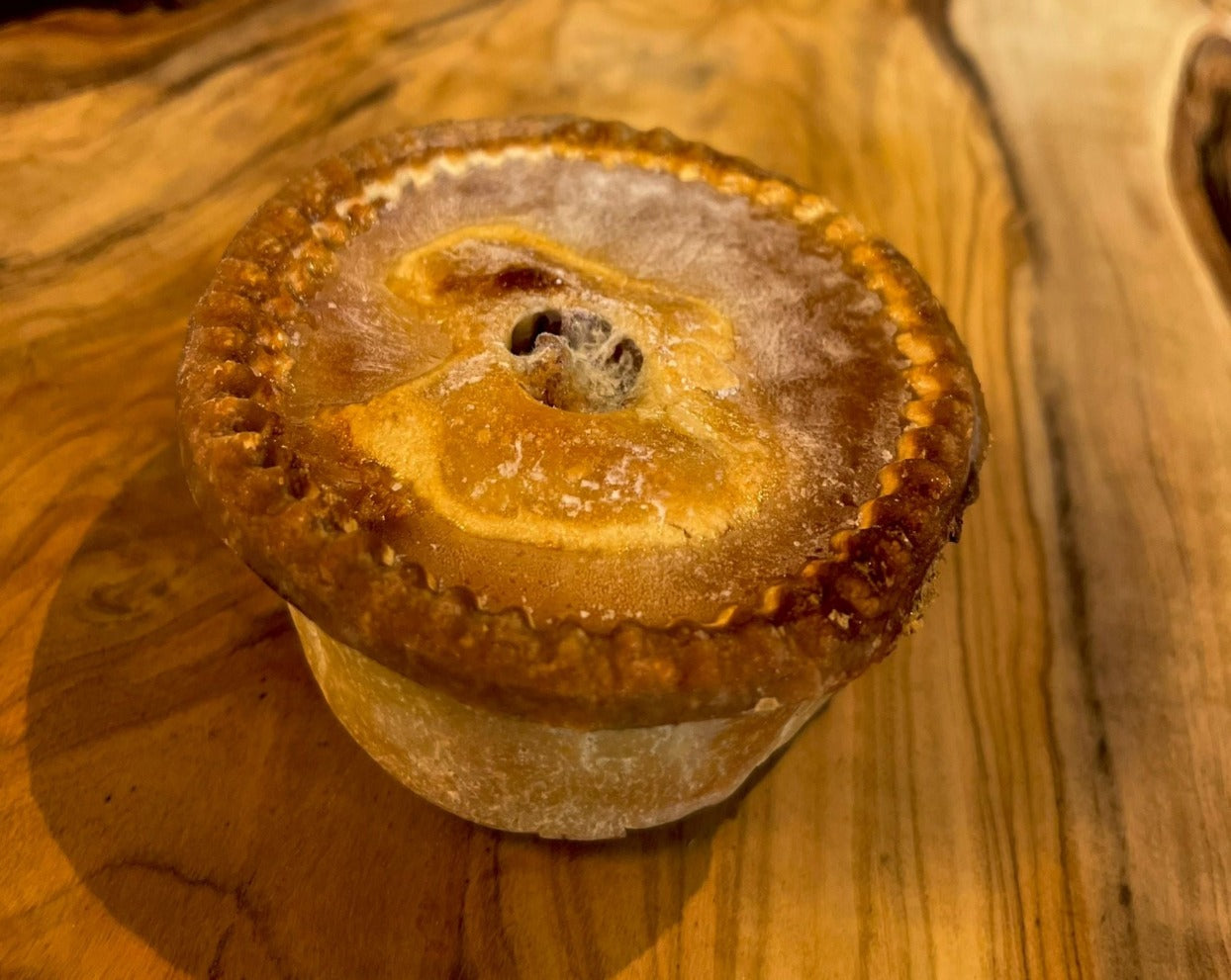 These traditional pork pies are made with ground pork seasoned with special seasoning in a rich pork jelly and set in a water crust pastry.