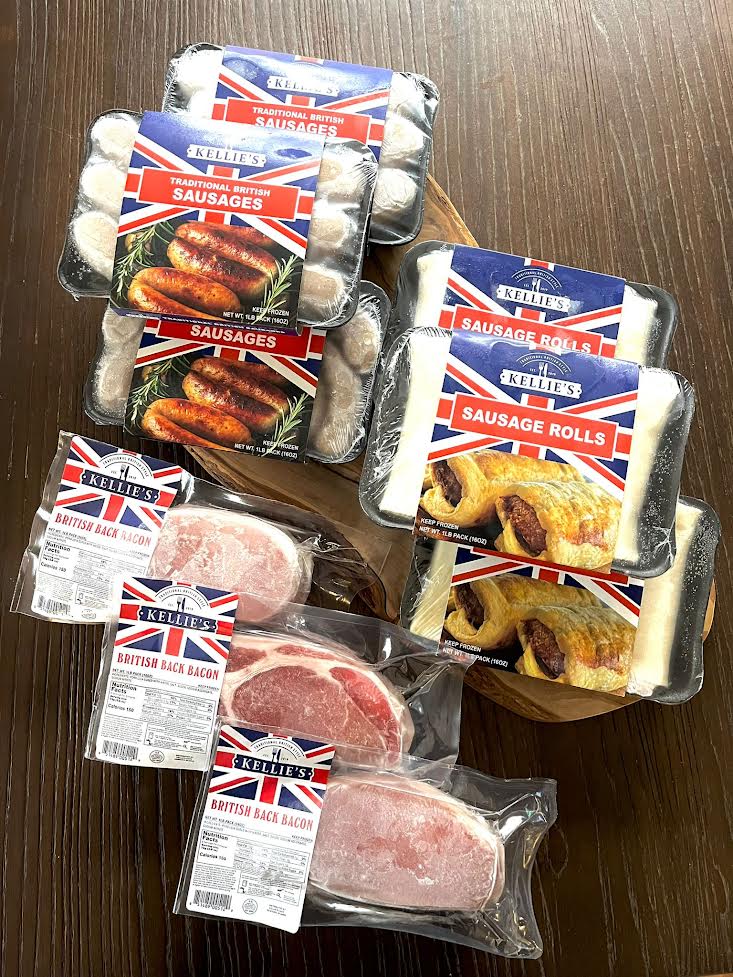 a selection of authentic British Food including; traditional sausage rolls, british sausages, and british bacon