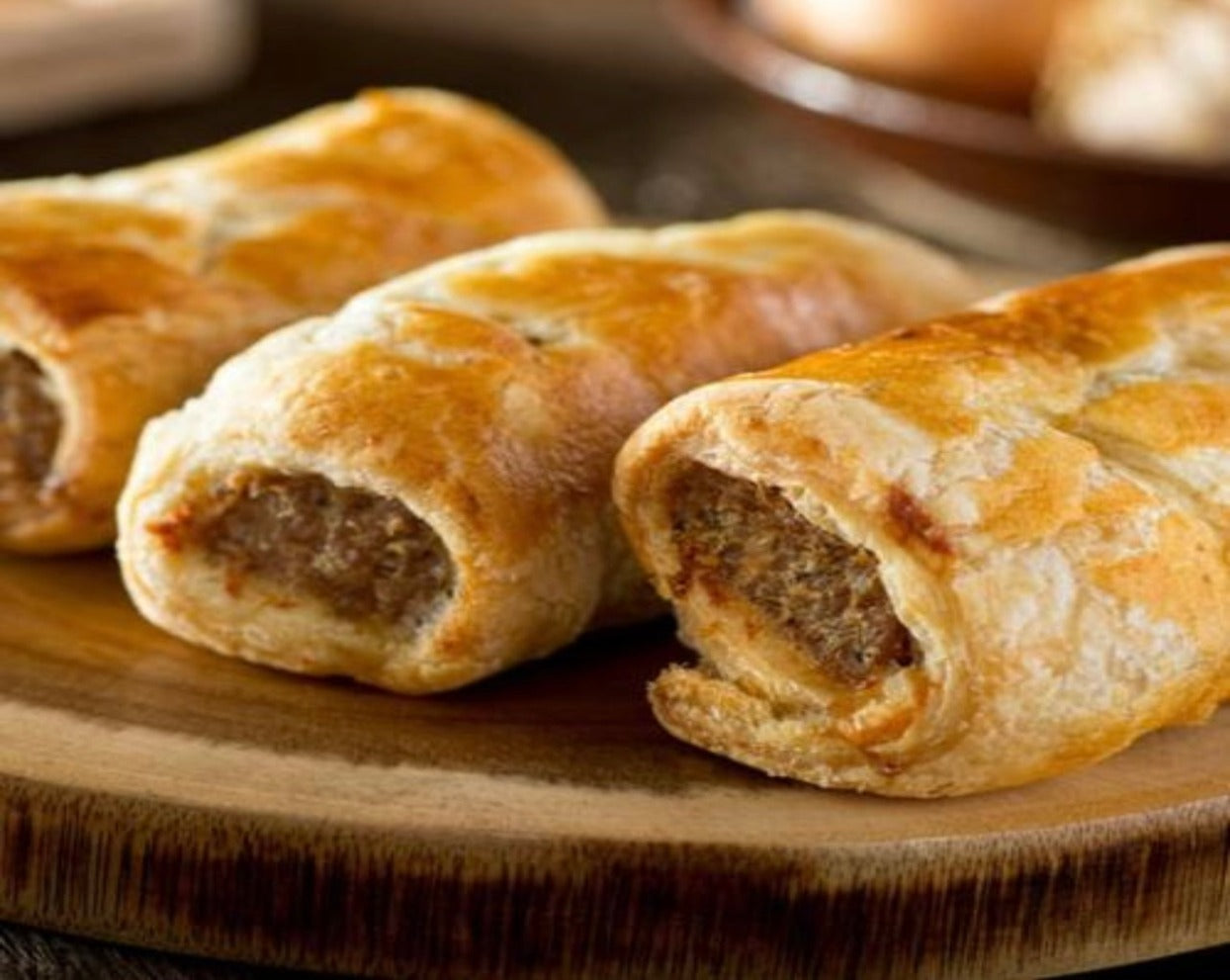 A 4 pack of Traditional British sausage rolls. Sausage meat wrapped in flaky puff pastry, cooked to perfection