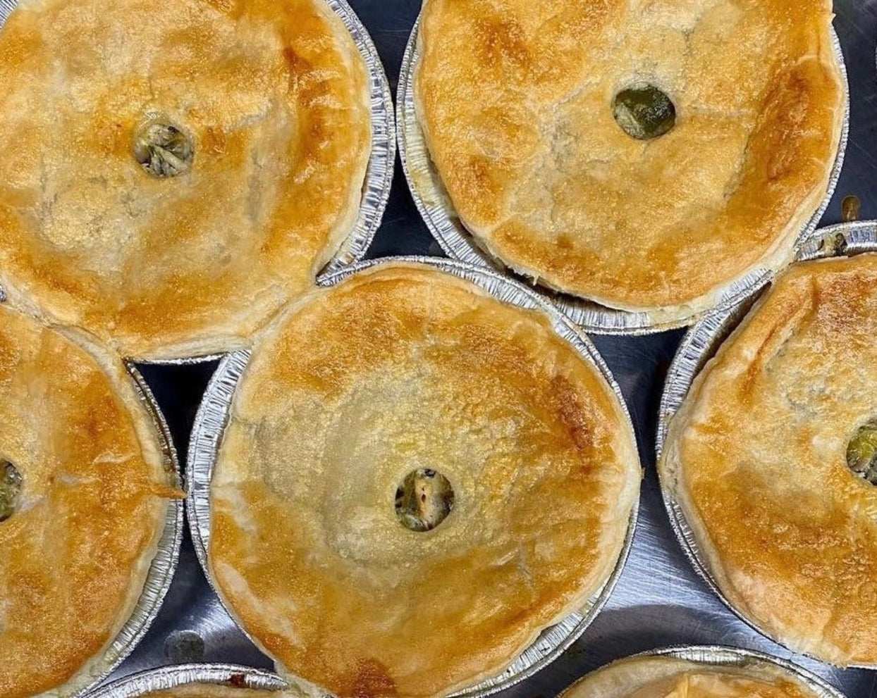 A selection of authentic english chiicken and leek pies cooked to perfection