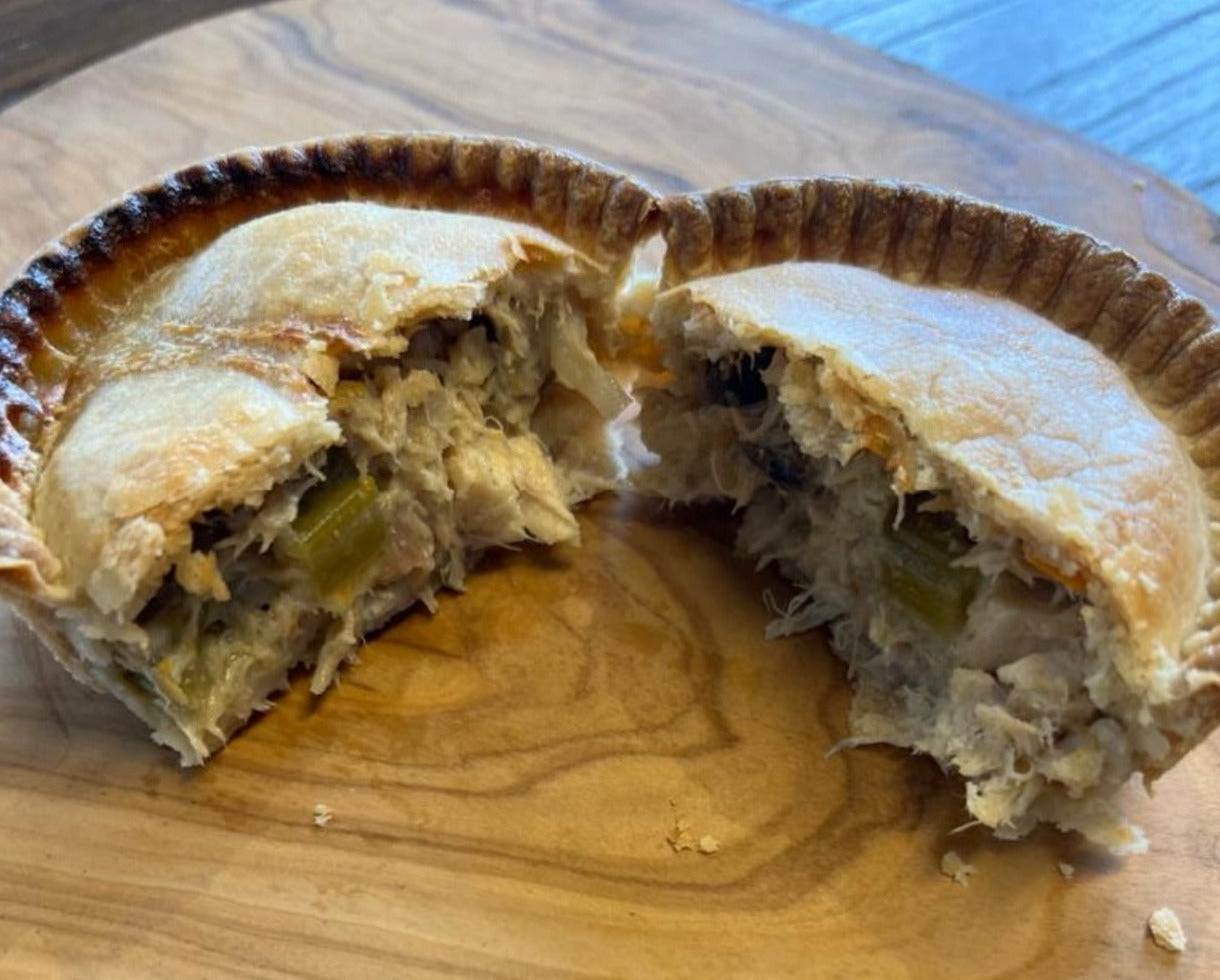 A well-made British Chicken & Mushroom Pie cut open