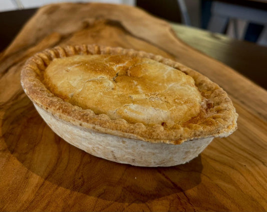 Fork-tender beef and kidney pieces with carrots, peas and onions in a rich gravy. Encased in a shortcrust pastry