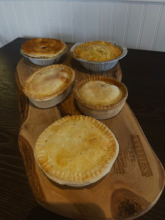 A variety of authentic English Pies including; a chicken & leek pie, a chicken & mushroom pie, a steak & ale pie, a steak & kidney pie, and a shephers pie.